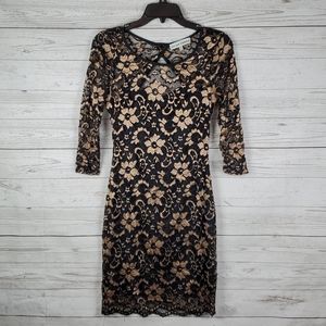 HP🎉 Almost famous body con black and gold dress